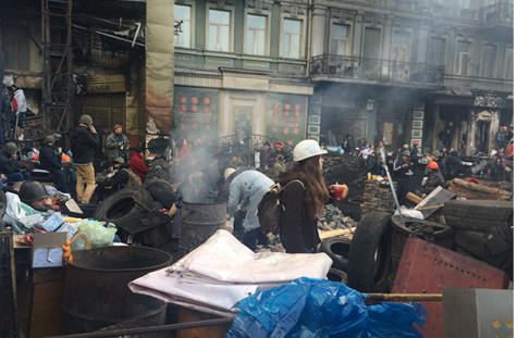 Protesters manning a barricade in downtown Kiev outside the apartment of Mihail Solomonovich, an 82-year-old recipient of aid from JDC who has been homebound since deadly clashes began last week; courtesy JDC.