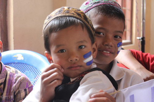 Two young children of the Bnei Menashe in India celebrate Israel Independence Day. Photo Credit: Tzvi Khaute, Courtesy of Shavei Israel.