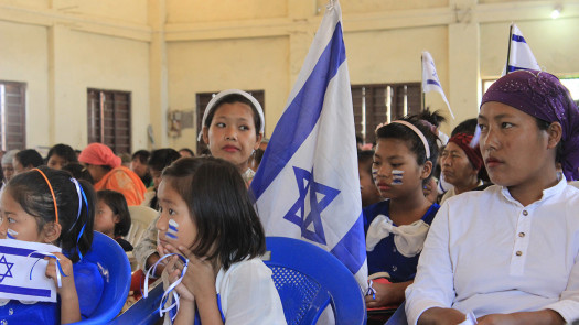 More than 1,500 members of the Bnei Menashe Lost Tribe, including these women and children, celebrate Israel Independence Day in Churachandpur, India. Photo Credit: Tzvi Khaute, Courtesy of Shavei Israel.
