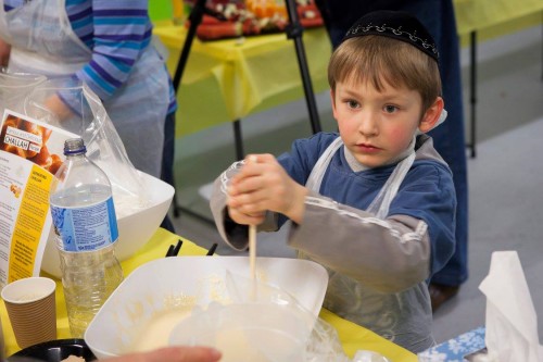 Sasha Krapivin busy making challah.