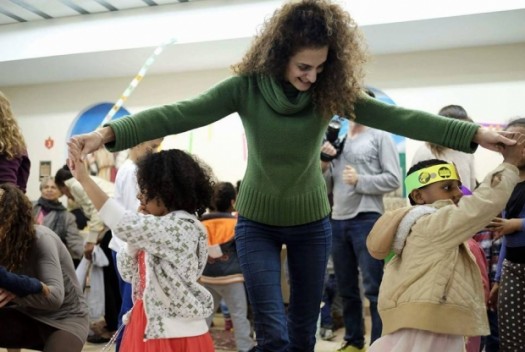 Beit Tefilah Israeli chanukah celebration with children of refugees in South Tel Aviv; courtesy BTI.