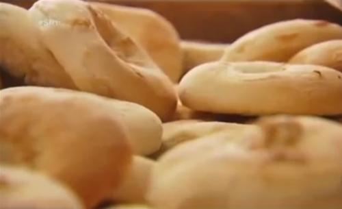 Bialys from Kossar's, formerly owned by Juda Engelmayer and his wife; photo from YouTube.