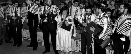 Amy Eilberg, the first Conservative female rabbi, at her ordination from the Jewish Theological Seminary, 1985. Photo copyright by Joyce Culver; screenshot Women Rabbis.