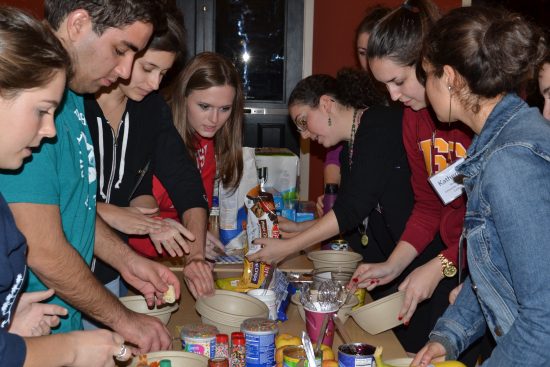 Challah for Hunger student leaders preparing challah, which they then sold to raise money for anti-hunger causes. Photo by Nick Thompson.