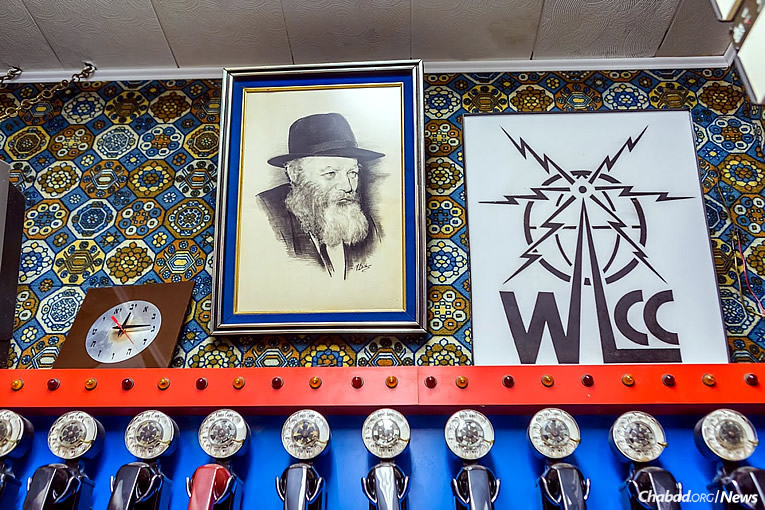 WLCC’s logo, as seen in the room today (Photo: Eliyahu Yosef Parypa/Chabad.org)