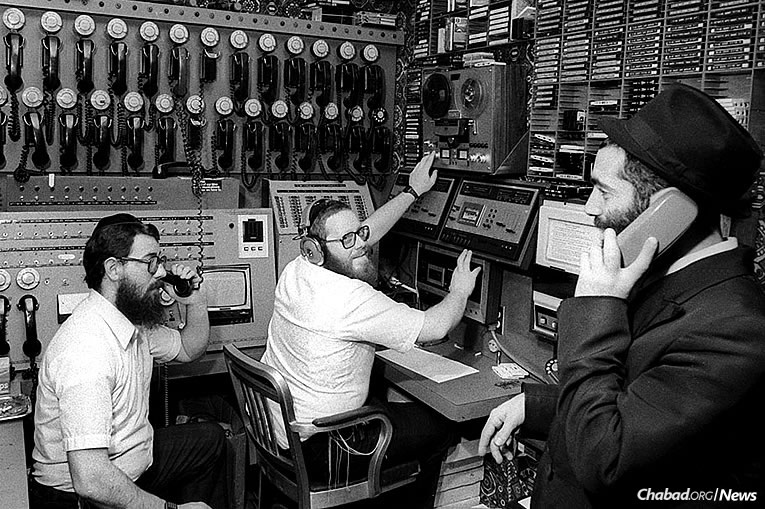 (l-r): Rabbis Chaim Boruch Halberstam, Yosef Yitzchak (Y.Y.) Kazen and Yonasan Hackner hard at work in WLCC, Nov. 27, 1980 (Photo: JEM/The Living Archive)