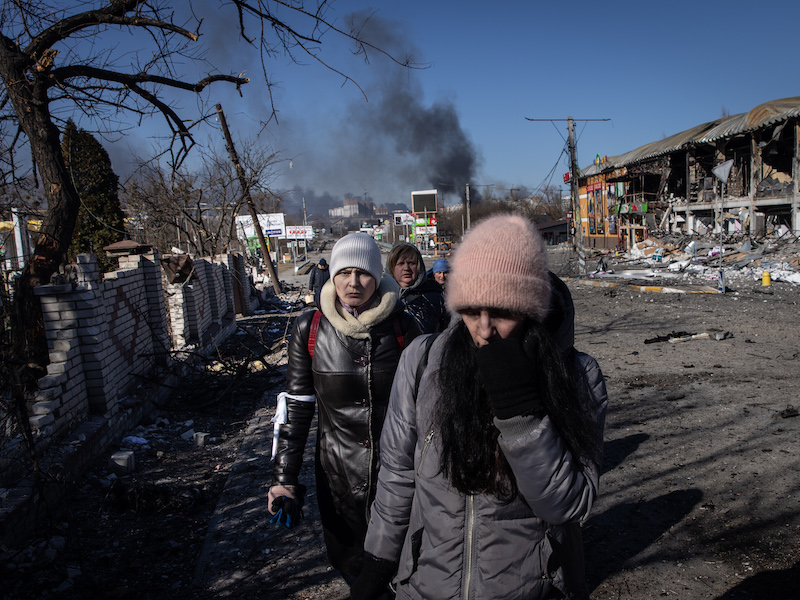 Ukrainians evacuate from a suburb of Kyiv on March 10, 2022.