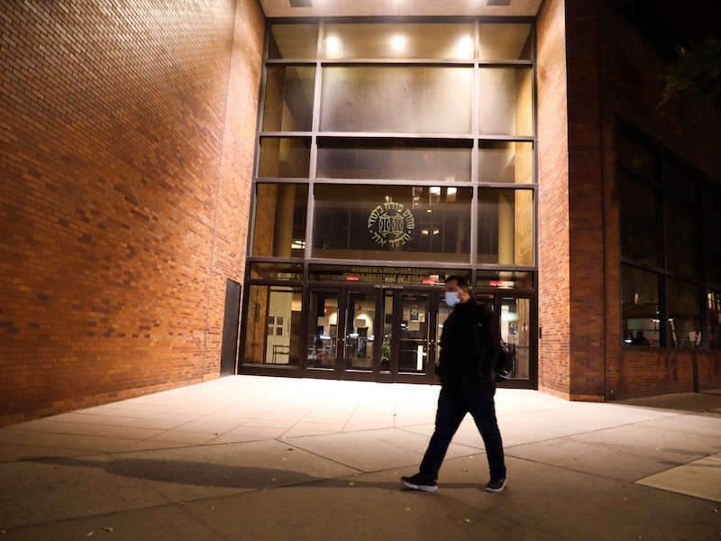 A pedestrian walks past the building of the Hebrew Union College in New York, the United States, Nov. 11, 2021.