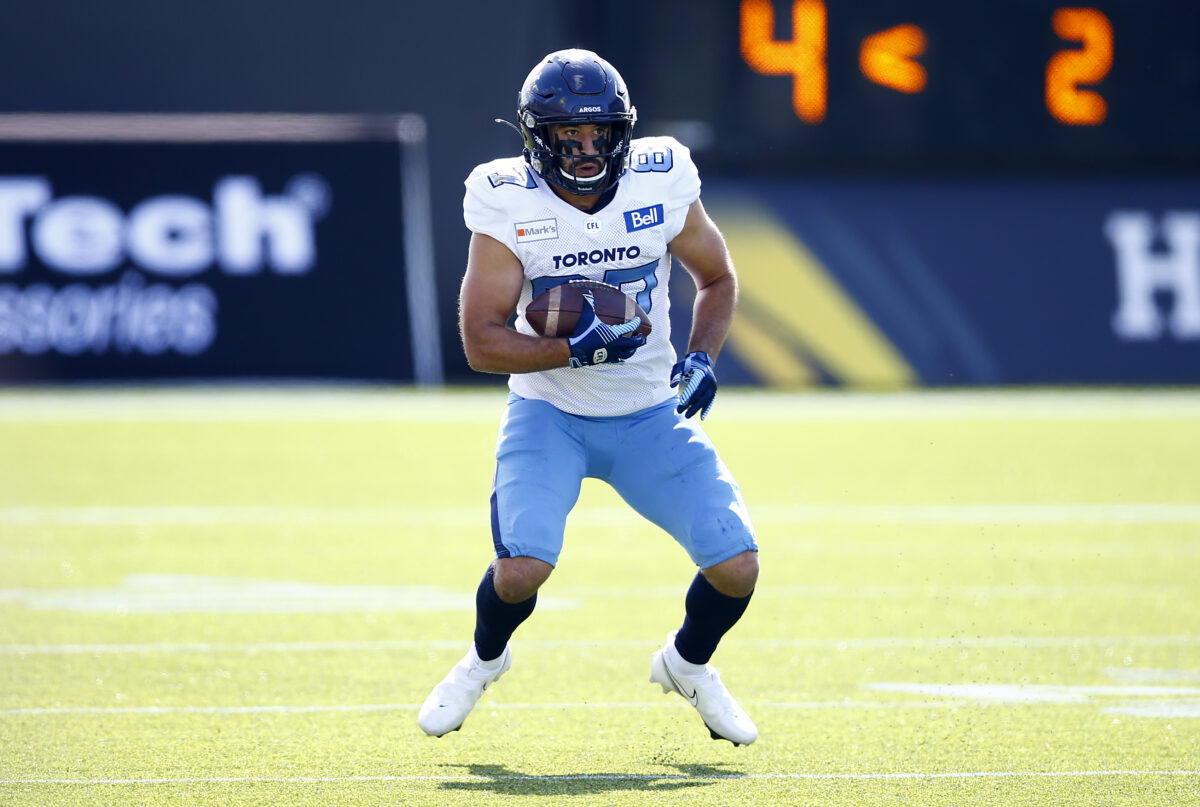 Daniel Braverman #87 of the Toronto Argonauts runs with the ball during a CFL game against the Hamilton Tiger-Cats at Tim Hortons Field on September 6, 2021 in Hamilton, Ontario, Canada.  