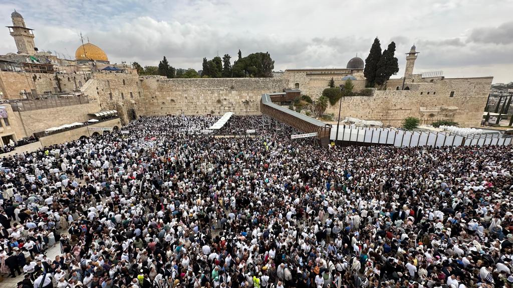 

Over 50,000 people attend the traditional Birkat Kohanim (Priestly Blessing) at the Western Wall in Jerusalem's Old City today, during Chol Hamoed (the intermediary days) of Sukkot.
