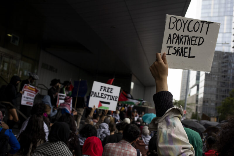 CUNY students of Palestinian descent and their allies hold a rally demanding that the university system divest from Israel on May 28, 2021, at John Jay College in New York City.